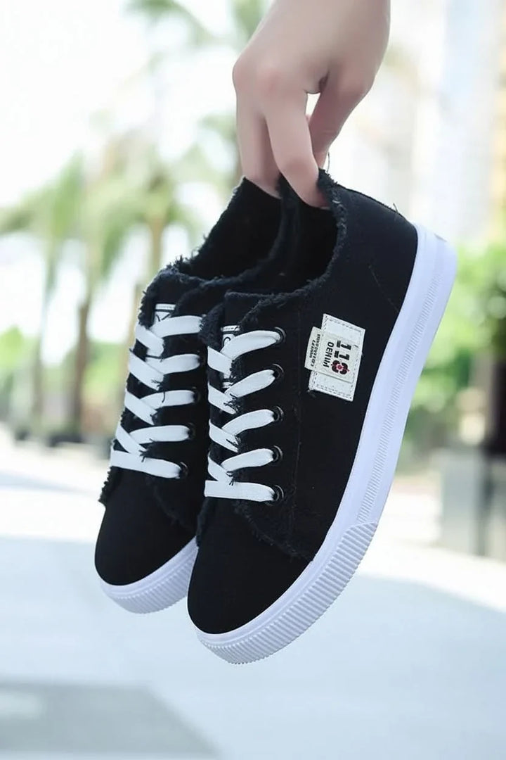 Comfortable unisex high-top sneakers, classic lace-up design for versatile everyday casual footwear.