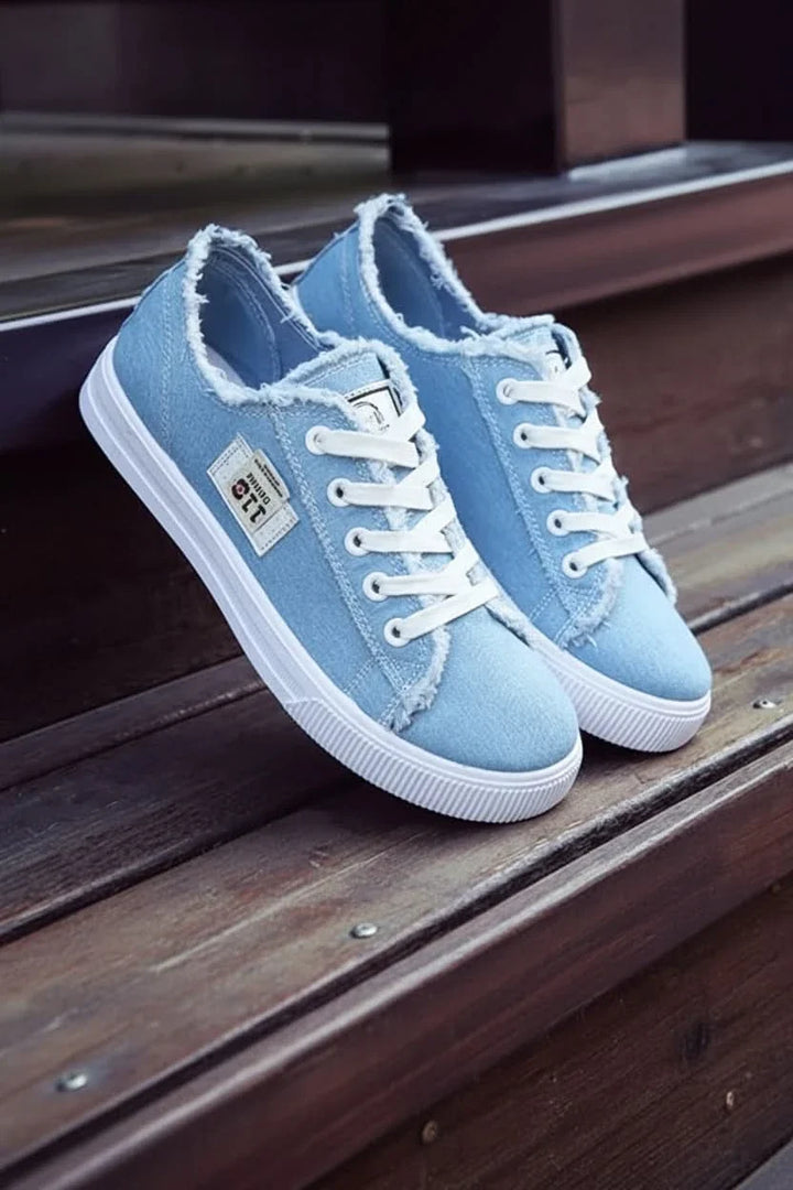 Everyday unisex high-top lace-up sneakers, providing comfortable street style & versatile footwear.
