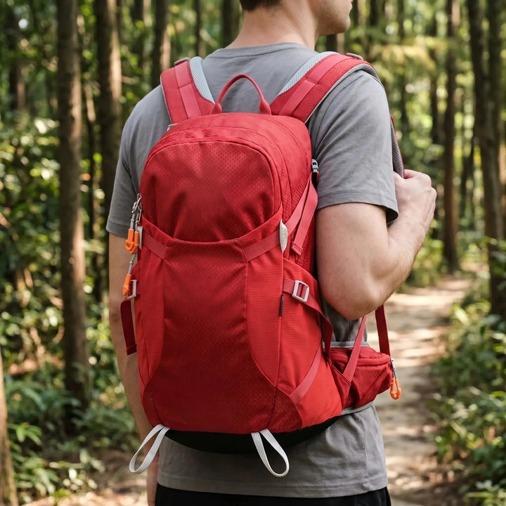 Unisex hiking backpack for outdoor adventures. Durable, water-resistant nylon for trail & camping gear.