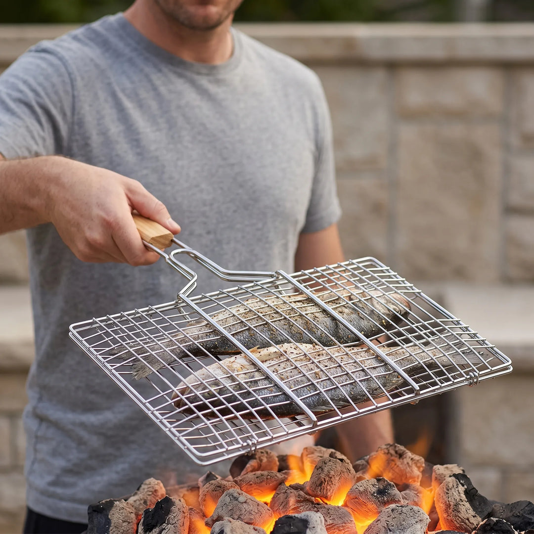Unisex hinged outdoor grilling basket for BBQ, campfire, fish, and vegetables. Easy-flip design.