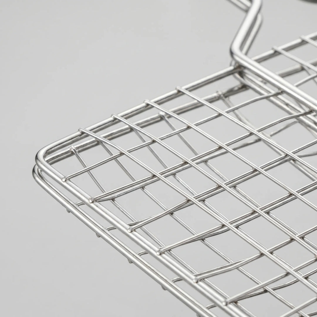 Durable hinged grill basket, perfect for outdoor cooking. Grilling tool for easy flipping of food on BBQ & campfires.