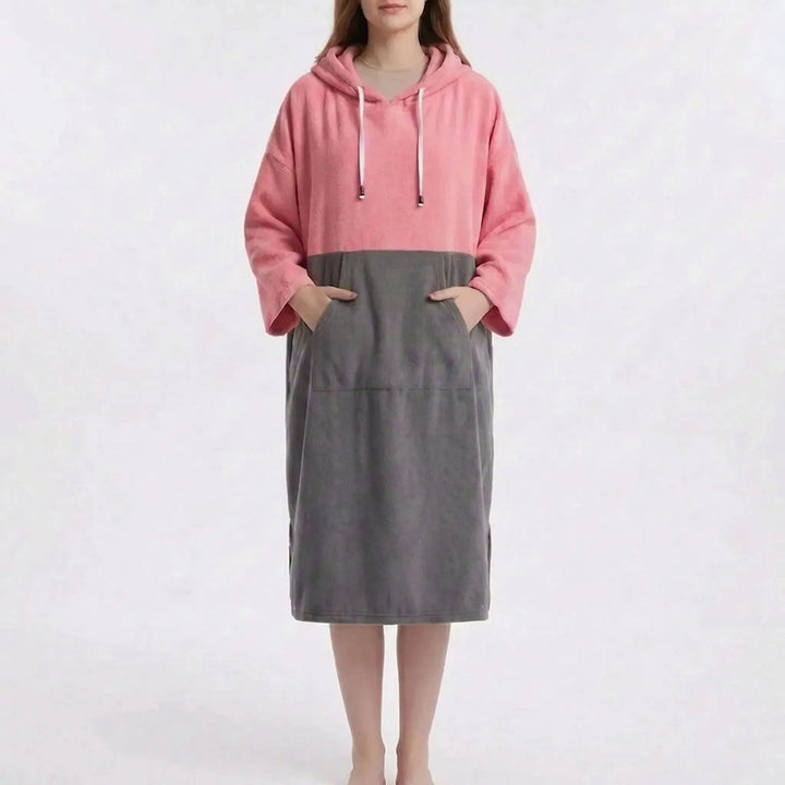 Oversized hooded poncho for discreet changing at beach or pool. Quick-dry unisex robe, essential watersports gear.