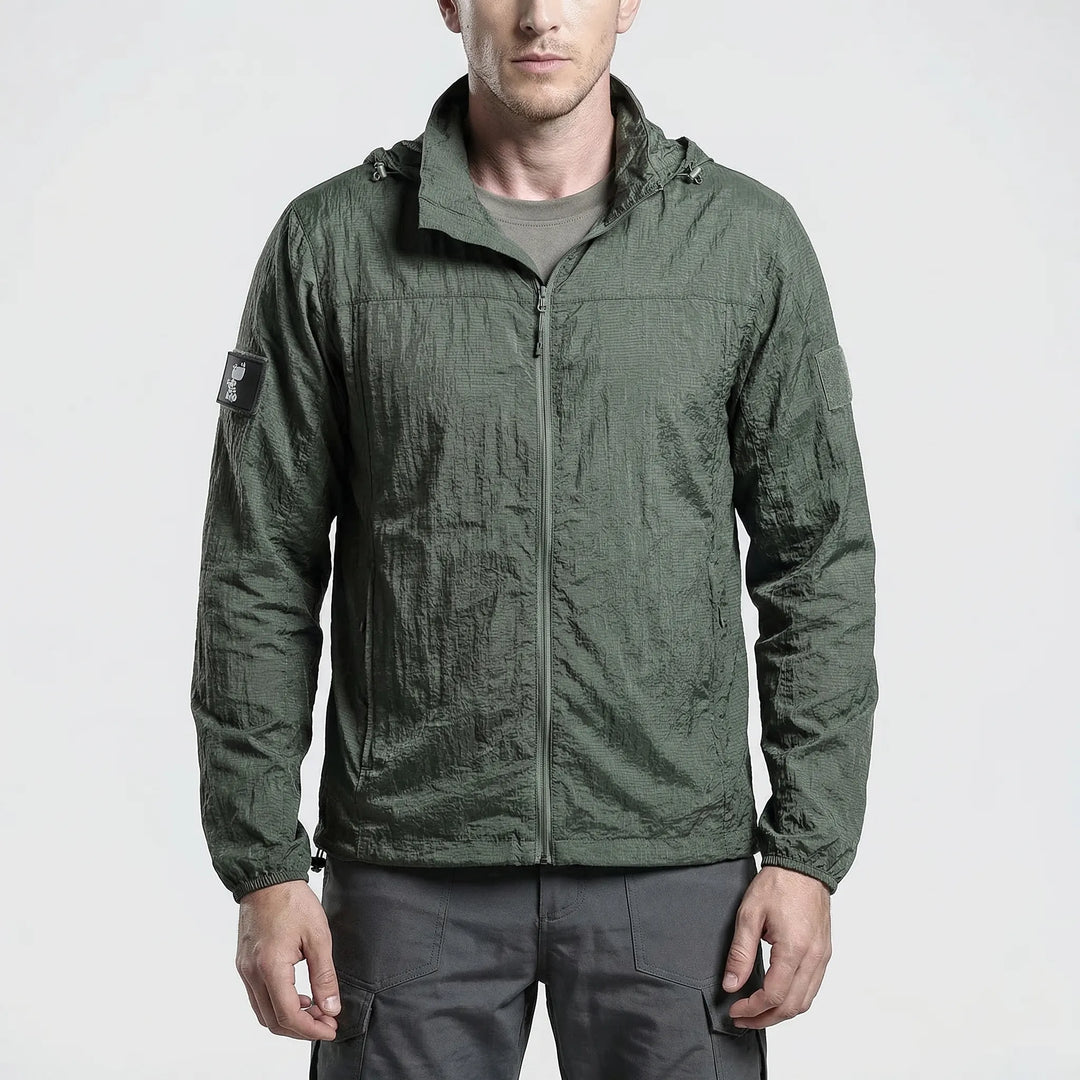 Close-up of lightweight, quick-dry, water-repellent tactical windbreaker fabric, ideal for hiking & outdoor use.