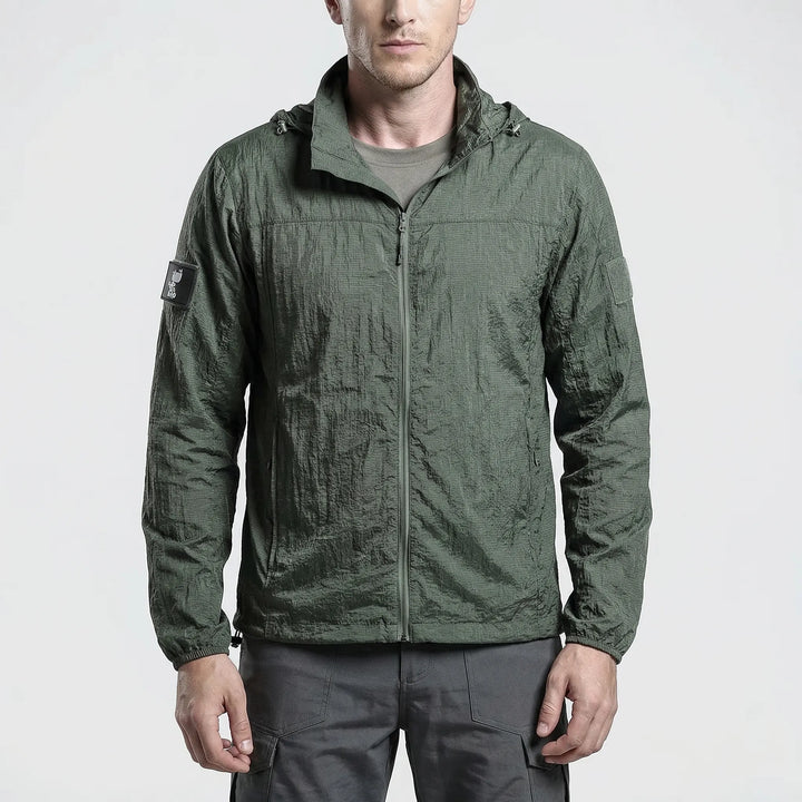 Close-up of lightweight, quick-dry, water-repellent tactical windbreaker fabric, ideal for hiking & outdoor use.