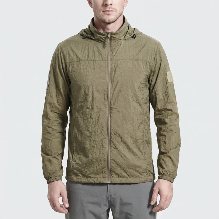 Unisex lightweight tactical windbreaker jacket offering hooded protection from wind & light rain. Quick-dry outdoor gear.