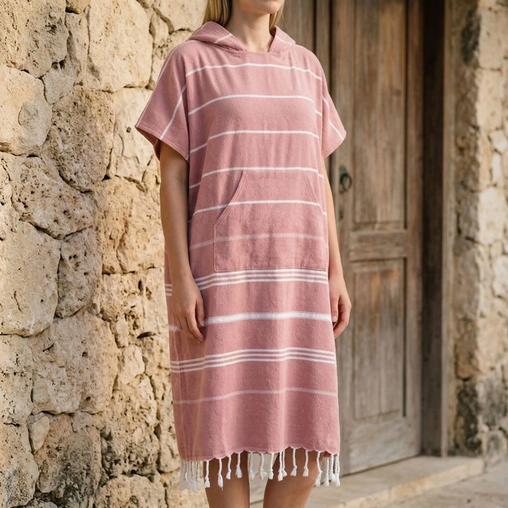 Oversized unisex quick-dry changing poncho. Versatile hooded travel gear for beach, poolside & water sports.