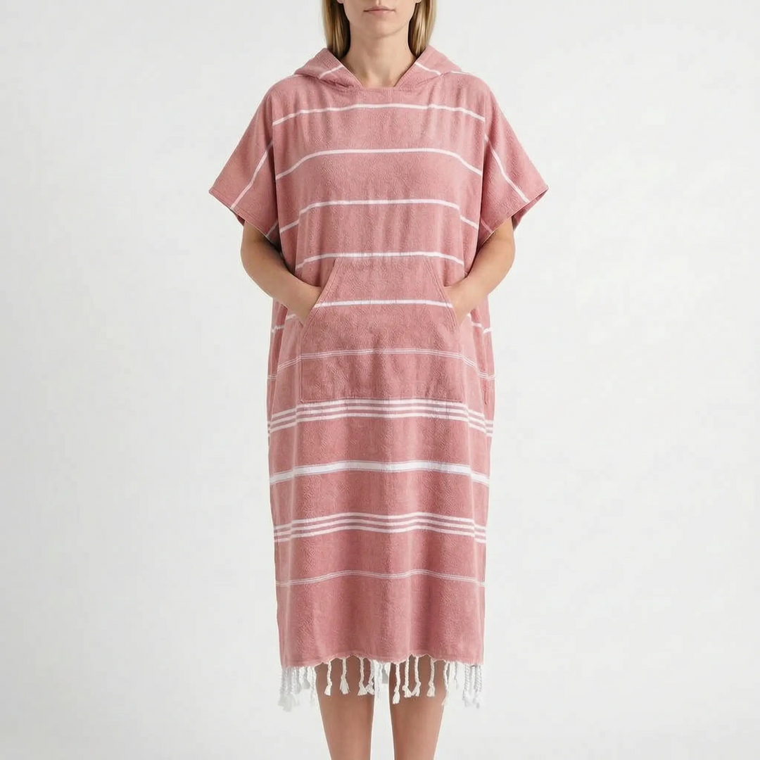 Lightweight quick-dry hooded changing poncho. Provides privacy & warmth as a beach towel & swim coverup.