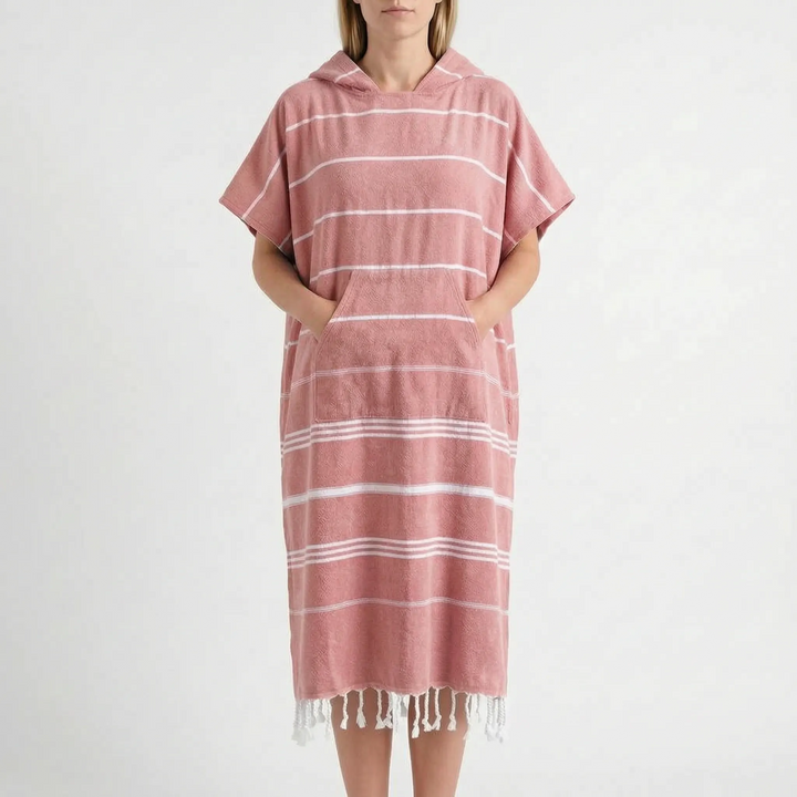 Lightweight quick-dry hooded changing poncho. Provides privacy & warmth as a beach towel & swim coverup.