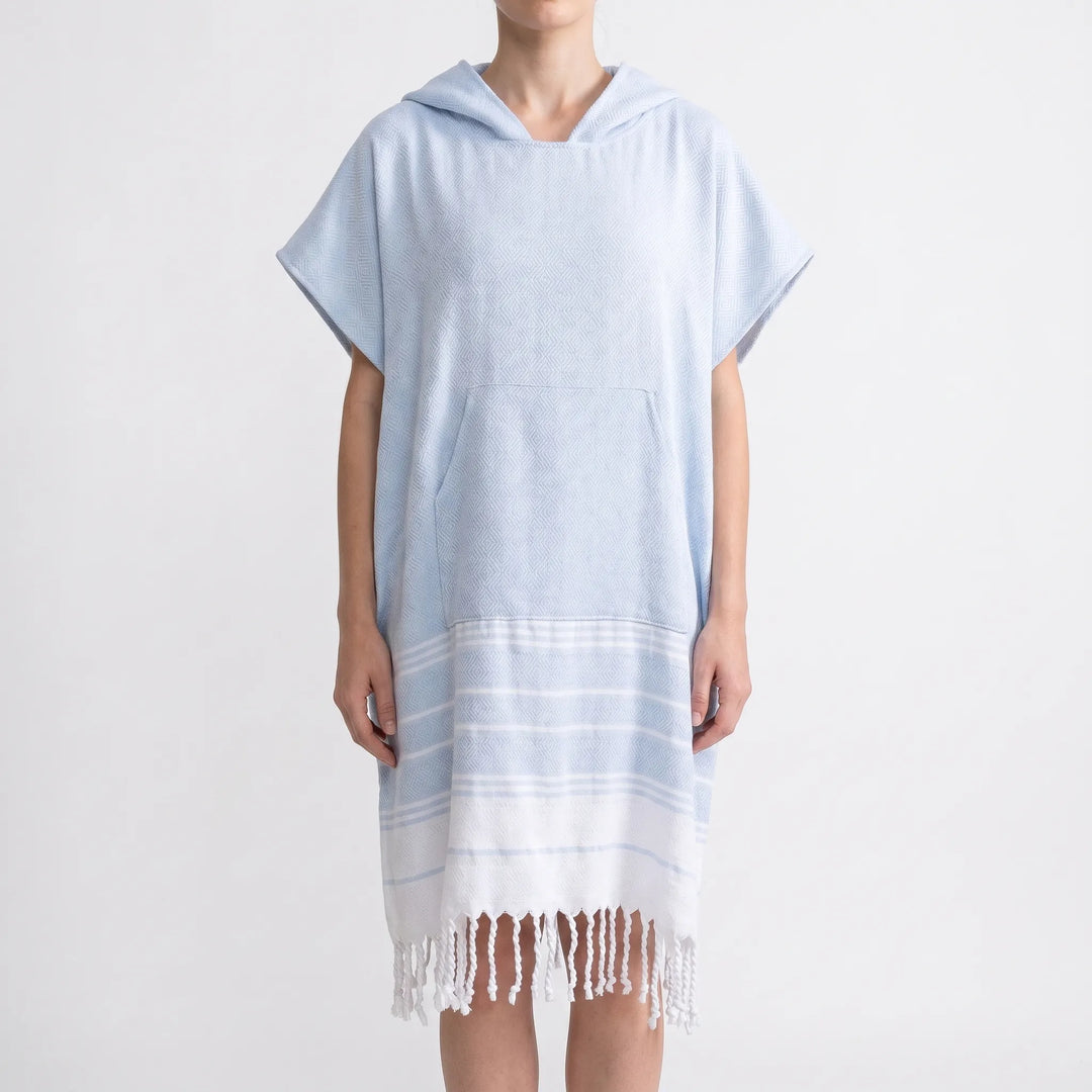 Effortless hooded towel poncho, perfect beach changing robe for all water activities.