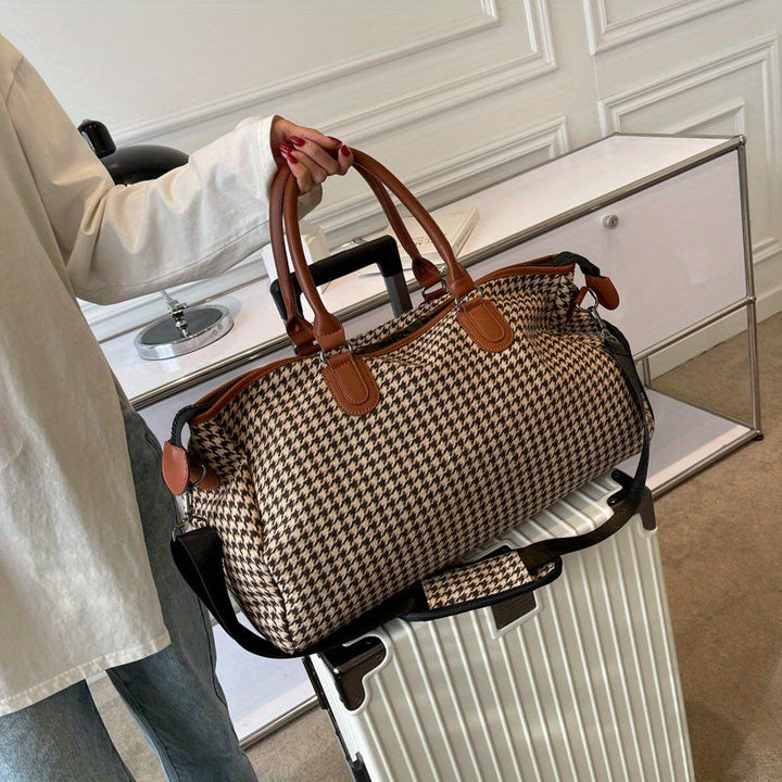 Stylish vegan leather houndstooth weekender bag. Unisex carry-on duffle, perfect for travel. Durable design.