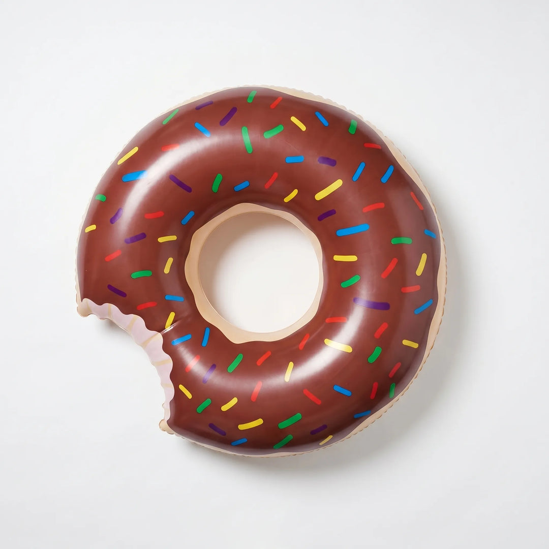 Vibrant donut pool ring, a fun inflatable novelty float perfect as a unique gift for summer.
