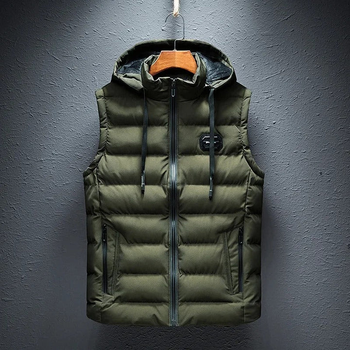 Unisex alpine vest with detachable hood. Water-resistant outer for superior outdoor warmth & protection.
