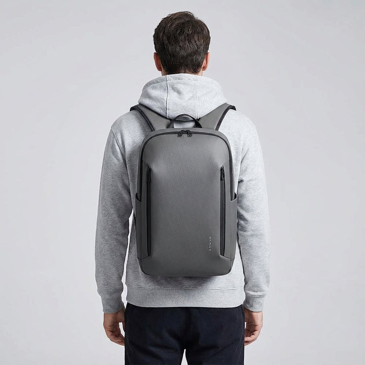 Sleek unisex commuter laptop backpack, perfect for students & business pros. Organized, durable & waterproof.