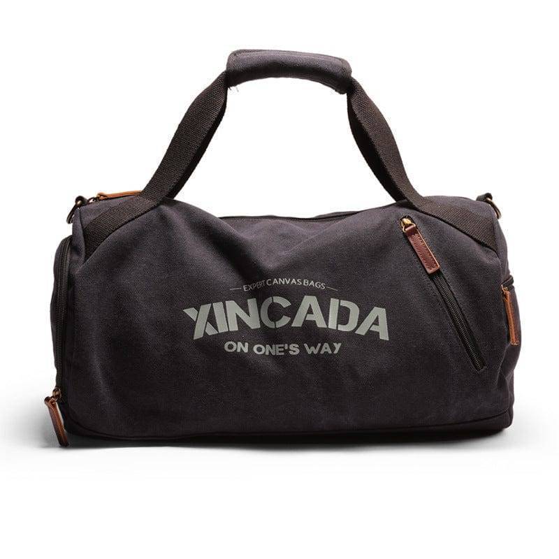Spacious canvas travel duffel bag, perfect for sports or outdoor gear, featuring a large main compartment and sturdy handles.