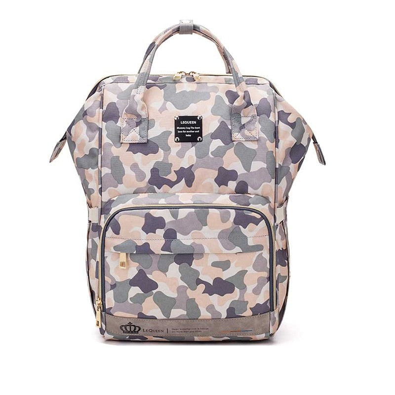 Functional unisex diaper backpack, large capacity with many pockets, essential for baby travel & parenting.