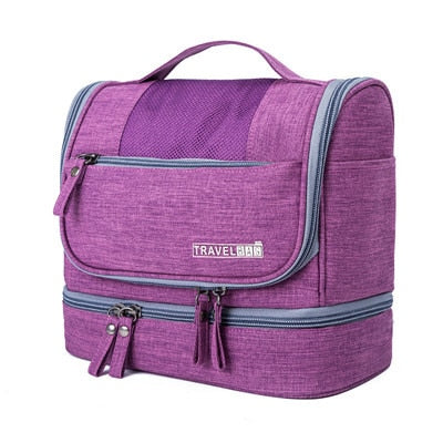 Portable large hanging cosmetic bag, multi-compartment design for organized travel, ideal for makeup & toiletries.