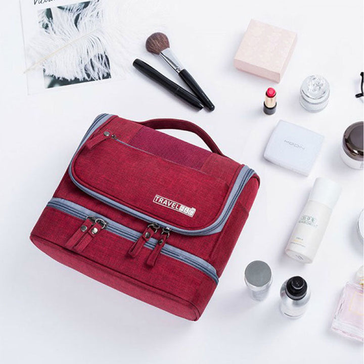 Durable multi-compartment unisex hanging toiletry bag, large capacity, waterproof, perfect travel organizer.