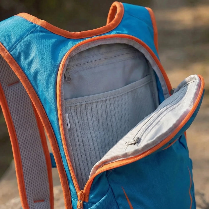 Unisex cycling hydration pack, 12L capacity, lightweight and water repellent. Essential cycling gear.