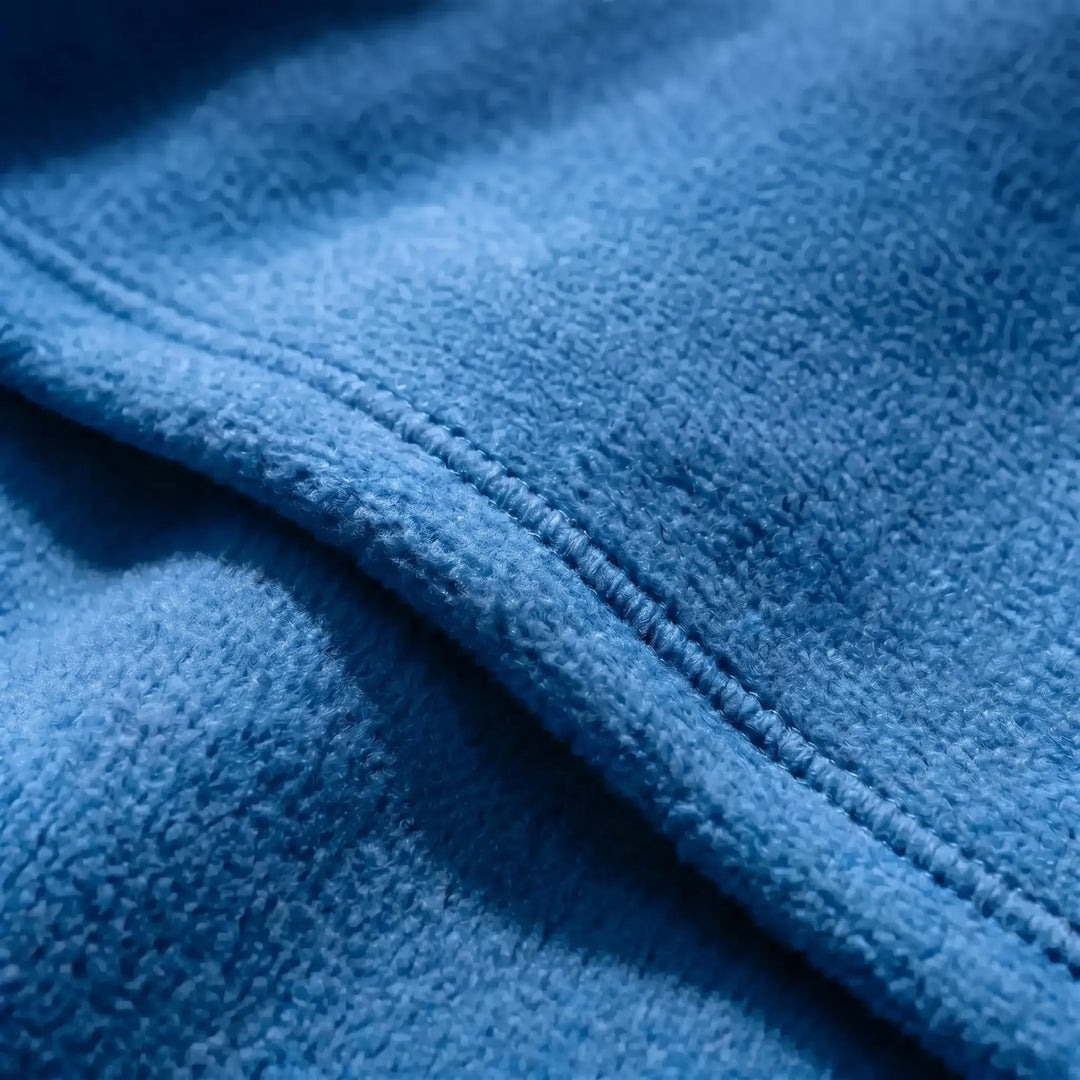 Adult 3-season fleece sleeping bag. Lightweight & compact roll-up for easy transport. Great for camping, hiking, travel.