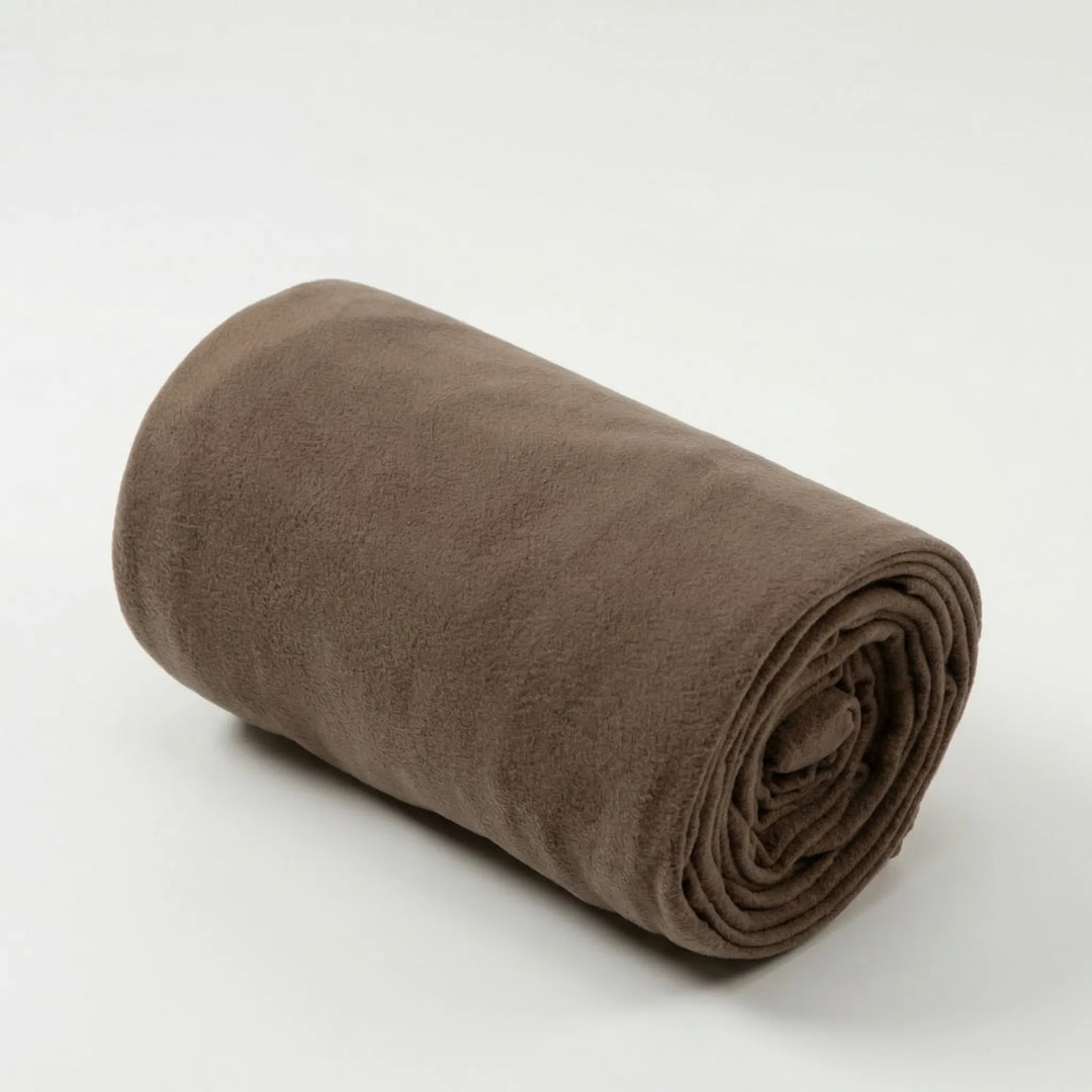 Compact, lightweight fleece sleeping bag for adults. Easy roll-up for camping, hiking, or travel. Soft & warm 3-season comfort.
