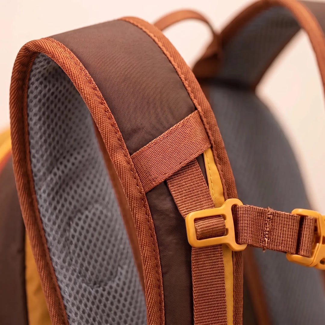 Lightweight, foldable nylon daypack for hiking, travel, and sports.