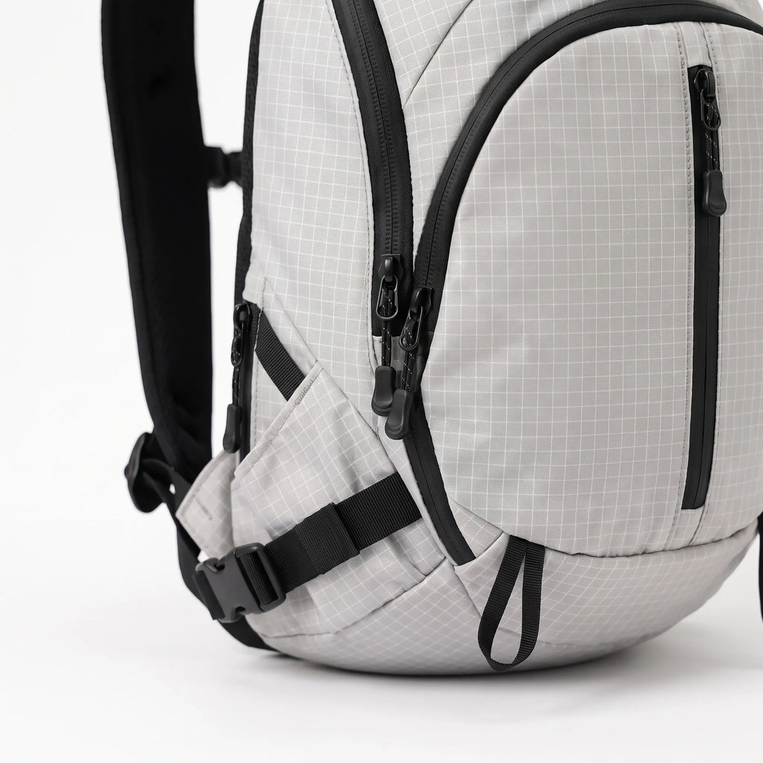 Compact daypack backpack with hydration compatibility for hiking & travel.