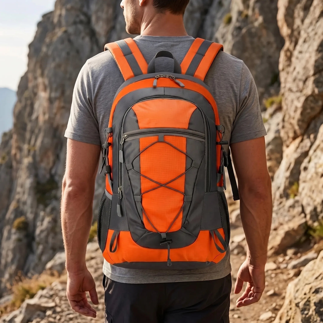 Unisex lightweight hiking daypack for outdoor trails. Breathable nylon, multi-compartment for adventure.