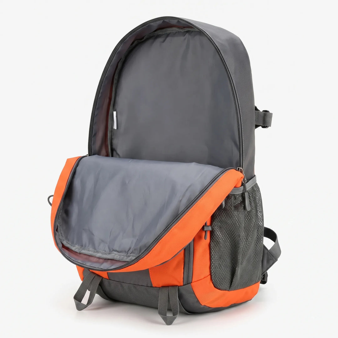 Adjustable chest & waist straps on a lightweight hiking daypack. Secure fit for outdoor trails & travel.