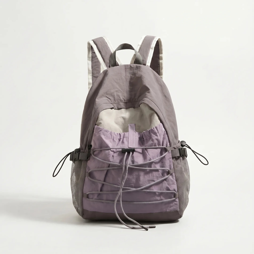 Compact outdoor hiking daypack, durable nylon for adventure & daily use.