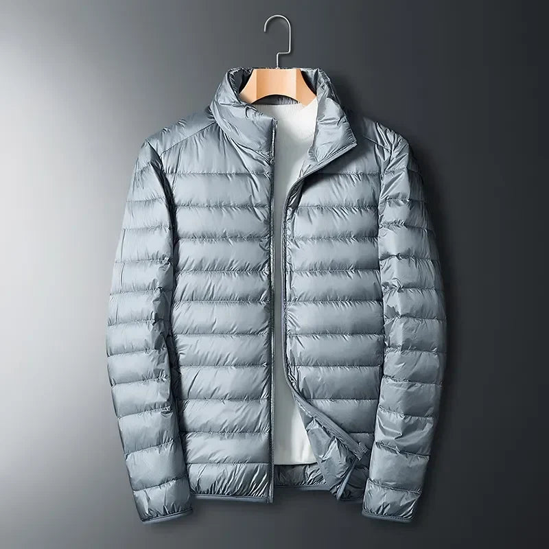 Durable unisex lightweight puffer jacket for outdoor gear, adventure apparel, and cold weather protection. Waterproof.