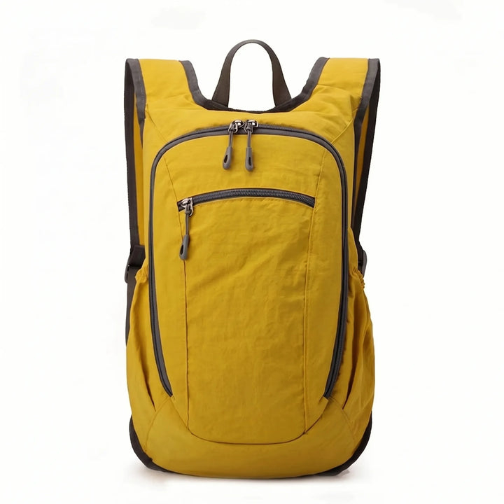 Compact & lightweight travel backpack, perfect for men & women, with versatile multi-pocket storage.