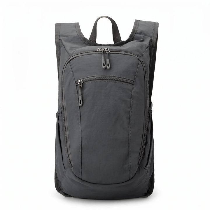 Versatile unisex travel daypack, lightweight and foldable, with multiple secure pockets for essentials.