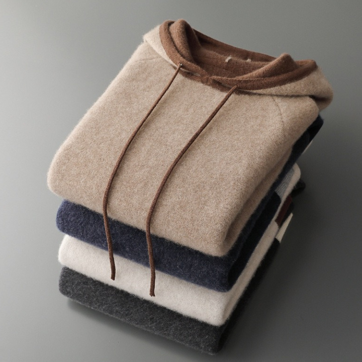Neatly folded luxury comfort unisex pullover hoodie, ready for cozy wear and everyday fashion.