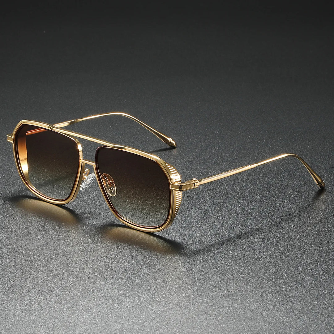 Chic unisex statement sunglasses with gradient lenses. Luxury fashion eyewear for sun protection.