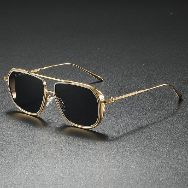 Silver-tone luxury statement sunglasses with UV400 lenses. Essential fashion eyewear for all.