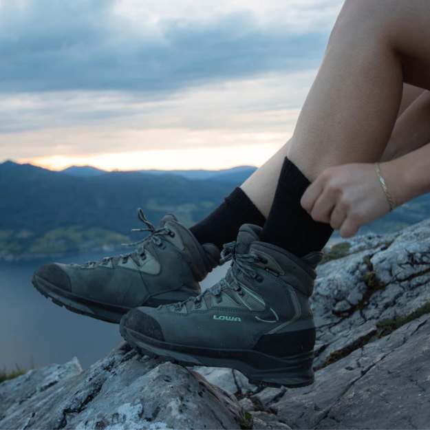 Pair of durable unisex trekking socks made from Merino wool, perfect for hiking
