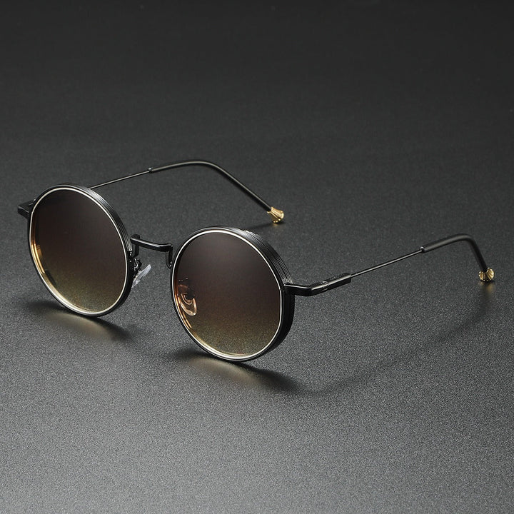 Classic metal round sunglasses, unisex and stylish. Offers full UV400 protection, ideal for retro fashion.