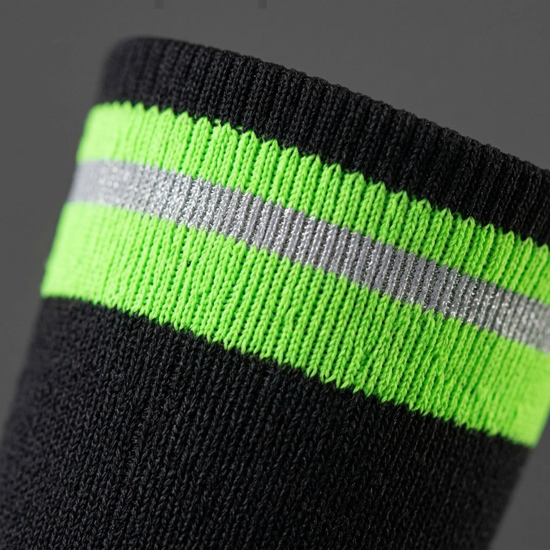 Mid-calf unisex athletic compression socks provide muscle support and recovery for training and sports.