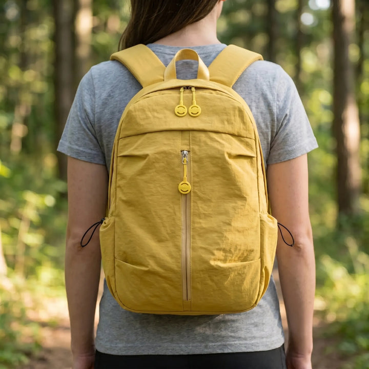 Unisex minimalist travel backpack, lightweight nylon, versatile for daily carry, work commute & short trips.