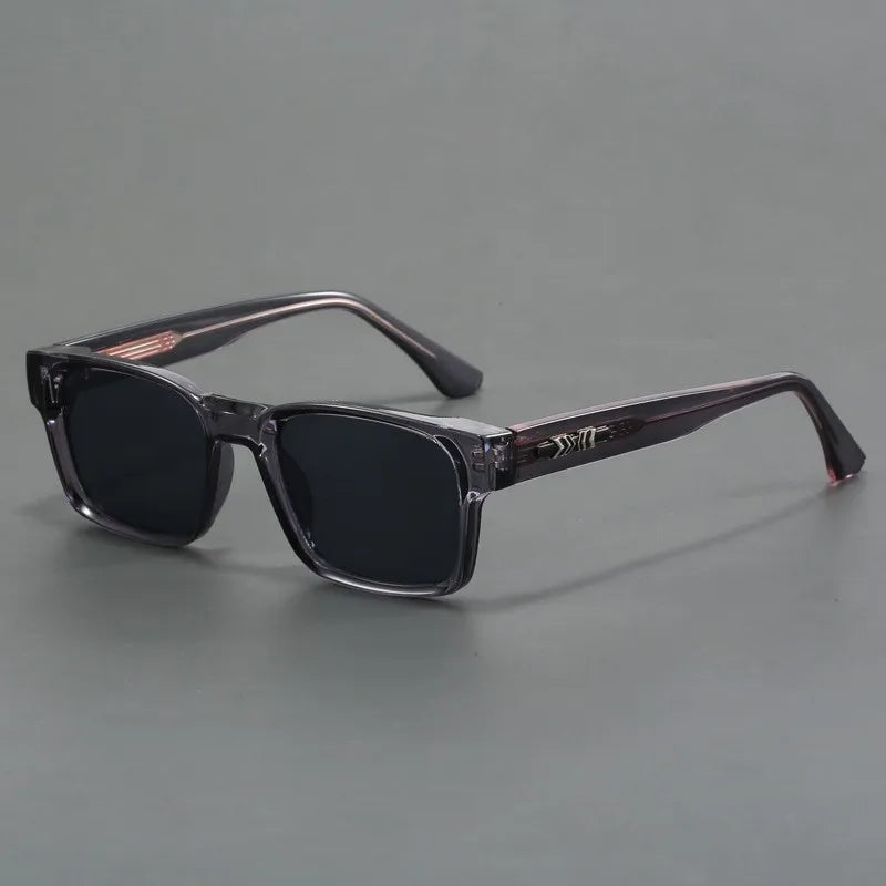Classic black square sunglasses, unisex, dark lenses & full UV protection. Essential eye protection.