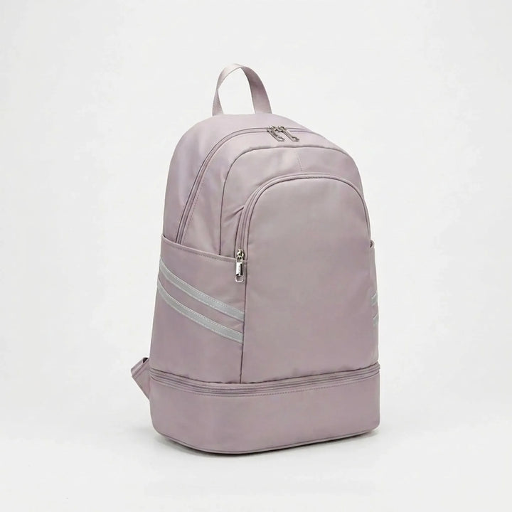 Organized multi-pocket sports backpack, perfect for gym, work, and daily essentials with laptop sleeve.