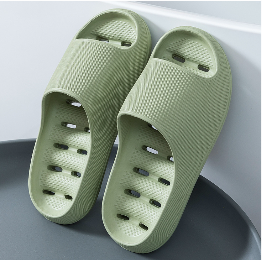 Plush, soft unisex home slippers, perfect as shower sandals or spa shoes, offering lightweight comfort indoors.