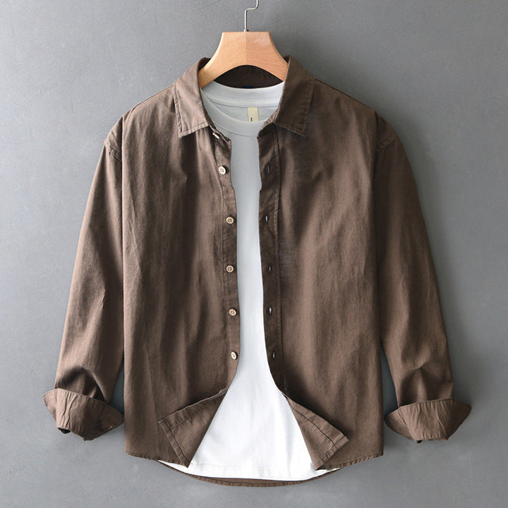 Comfortable brown unisex Nova relaxed fit button-up shirt, a versatile long sleeve for spring & summer casual style.
