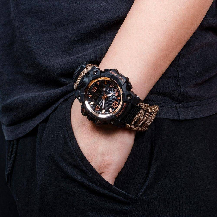 Waterproof military digital quartz watch for outdoor adventures, showing time, date, and stopwatch functions.