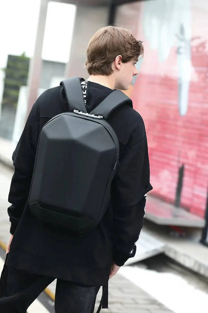 Detail of the USB charging port and volume controls on the outdoor backpack's music box.