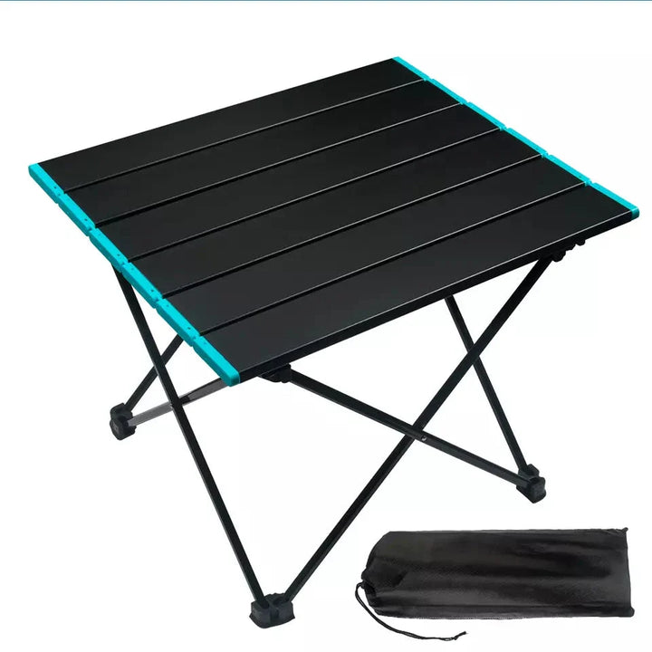 Close-up of the durable aluminum surface of the folding camping table, highlighting its sturdy construction.