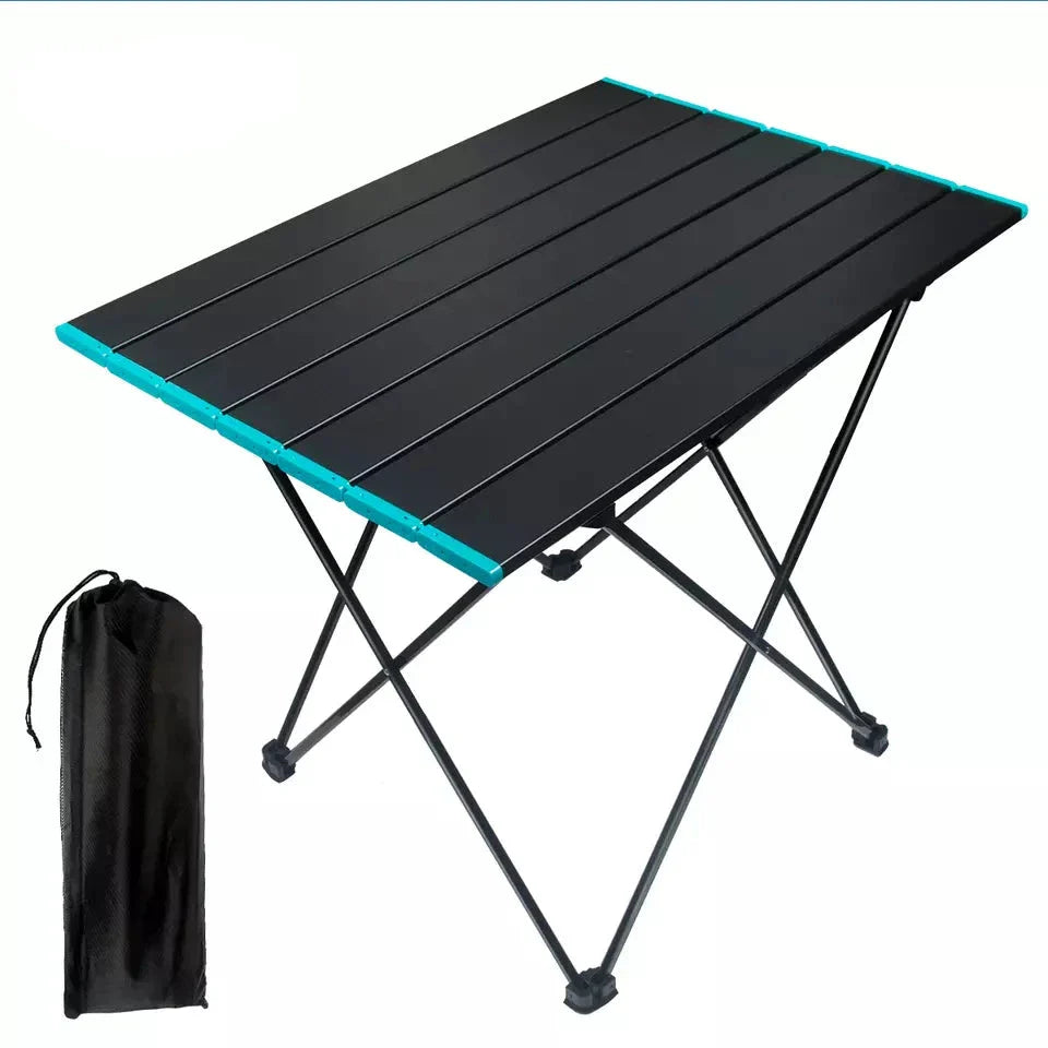 Unisex lightweight camping table with a beverage and snacks, showcasing its use as a picnic furniture.