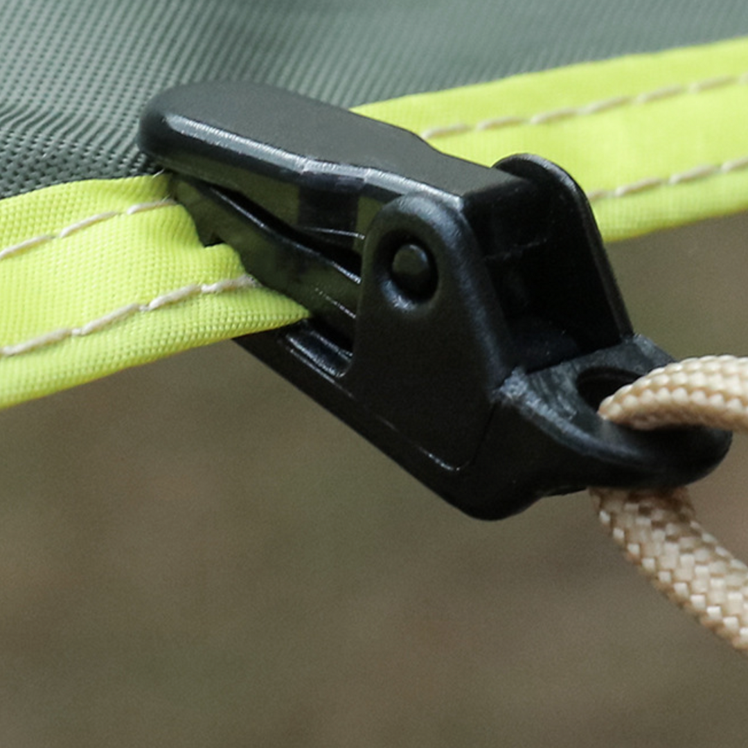 Portable utility clips for camping, showing a set of WindGrip Tent Clips on a white background