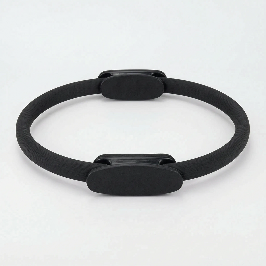 Comfort-grip Pilates exercise ring designed for yoga and fitness routines, improving muscle endurance and tone.