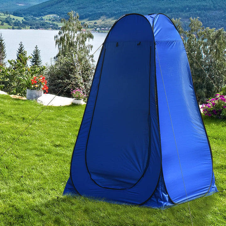 Unisex privacy tent, packed away in its round carry bag with shoulder strap, easy transport